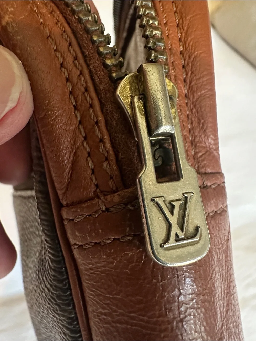 Authentic Louis Vuitton Monogram Pochette Sport.
